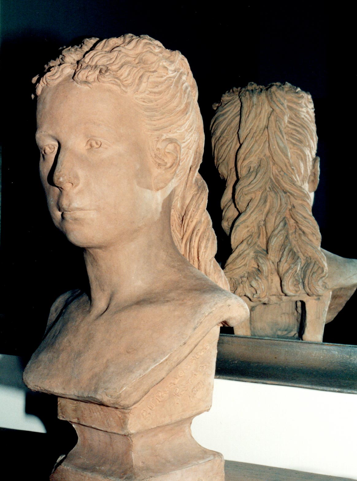 clay bust of Ella Moseley Husson aged 18
